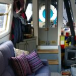A modern narrowboat view along the inside.